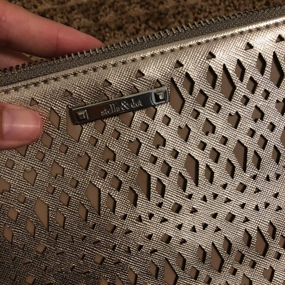 Stella & Dot metallic laser cut clutch handbag
